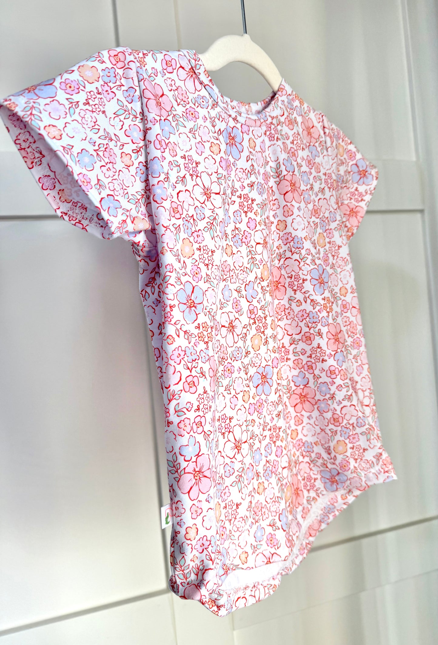 Pastel Petals Curved Hem Tee